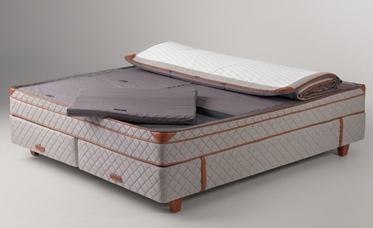 DUX 6006 contains two DUX innovations that together offer optimal comfort. The bed has exceptionally deep springs thanks to DUX double-spring system, with thousands of dynamically interlinked springs. Depending on the size, the bed features up to six Pascal cartridges divided according to the body three comfort zones – shoulders, hips, and legs. Each zone can be adjusted to be soft, medium, firm, or extra firm, allowing the bed to be adjusted to suit individual needs.