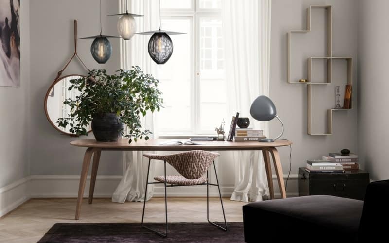 Satellite-pendant-lamps-Adnet-Circulaire-mirror-Mategot-Dedal-shelf-and-Masculo-chair_Gubi