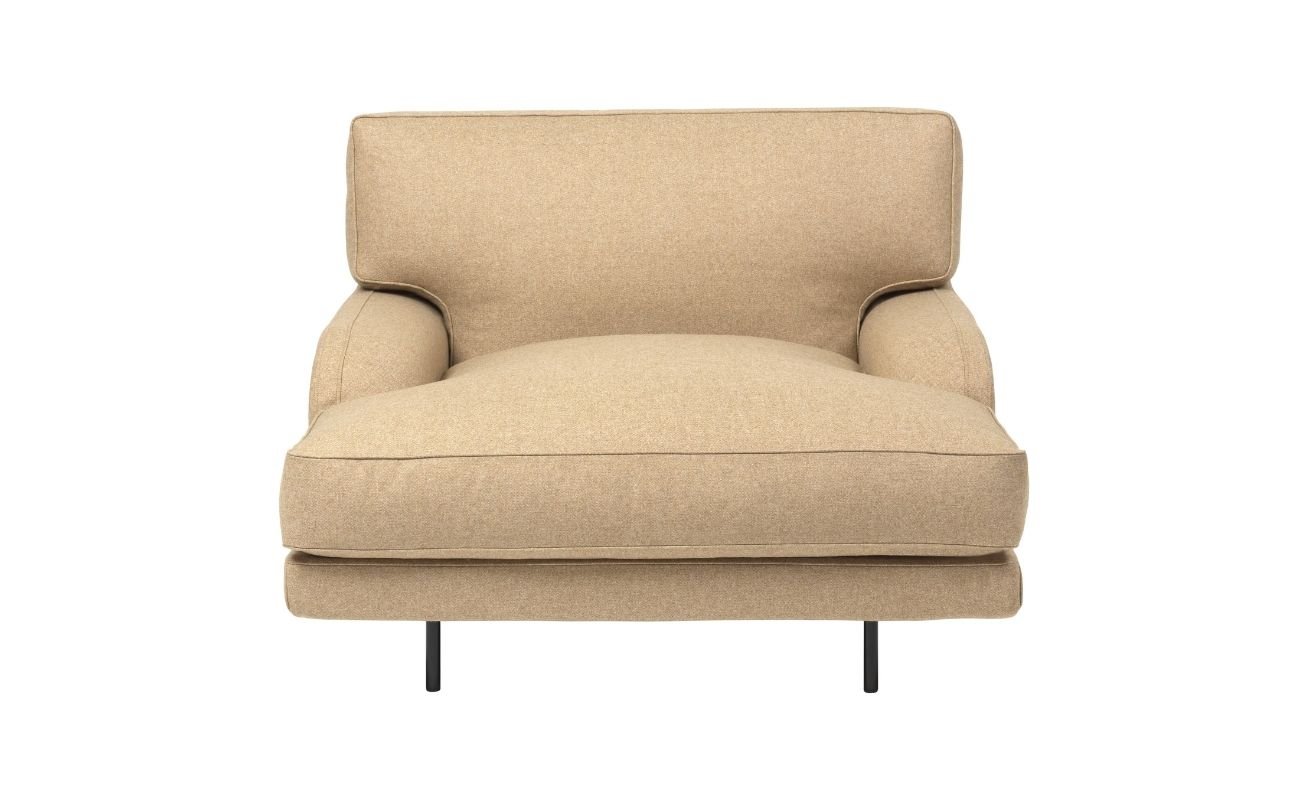 The Flaneur Lounge Chair is the perfect depiction of complete comfort, classic craftsmanship and modern convenience. Designed by Danish-Italian duo GamFratesi, the lounge chair is reimagined from the iconic 19th Century English roll-arm sofa in its exquisite marriage of the contemporary and classic.
The Flaneur Lounge Chairs generous seating proportions and rounded cushions reflects the Italian approach to comfort, while its overall precision in simplicity captures the essence of the Scandinavian design movement. 