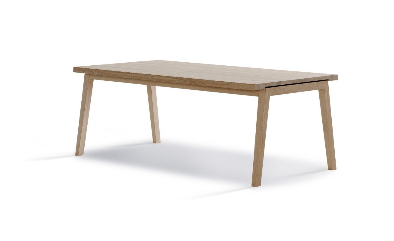 The SH900 Extendable Dining Table highlights modern Danish design with its minimalist look, integration of new structural possibilities, and the use of sustainable materials. This sophisticated dining table features a foldout system that expands easily, providing easy access to its built-in extension system. An excellent dining furniture that redefines elegance and Scandinavian design.