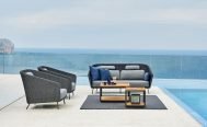 Cane-line Mega Outdoor Lounge Chair and 2 Seater Outdoor Sofa in Dark Grey with Light Grey Cushions - Danish Design Co Singapore