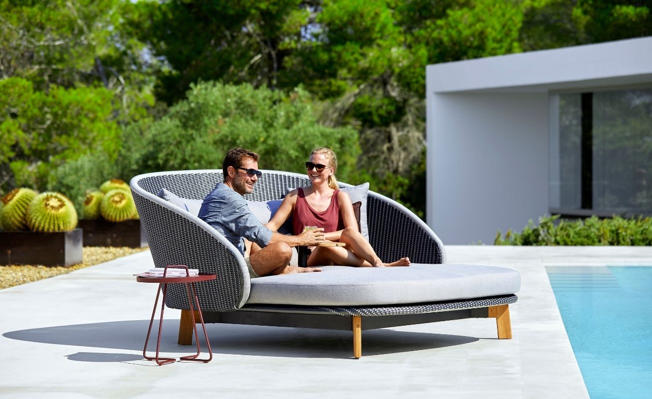 Cane-line Peacock Daybed, dark grey and light grey by the pool - Danish Design Co Singapore