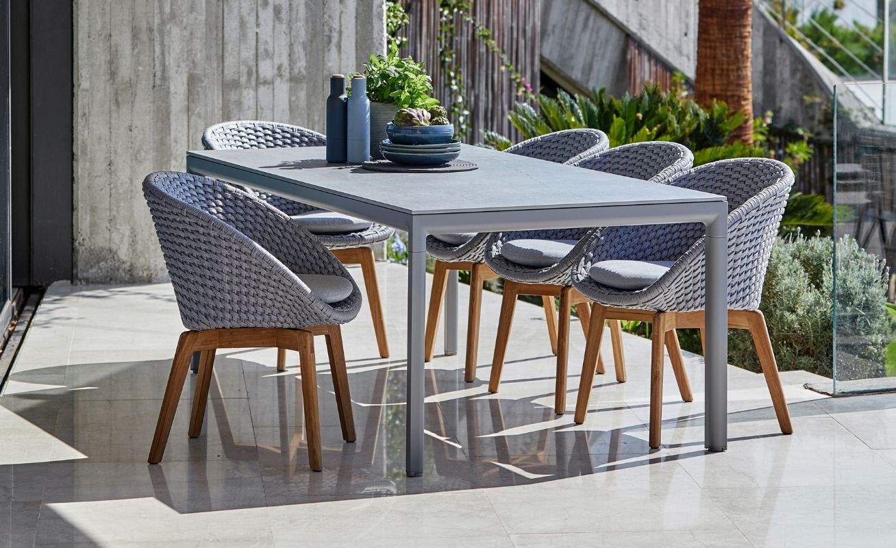 Cane-line Peacock Outdoor Dining Chair Light grey seat with light grey cushion and teak legs - Danish Design Co Singapore