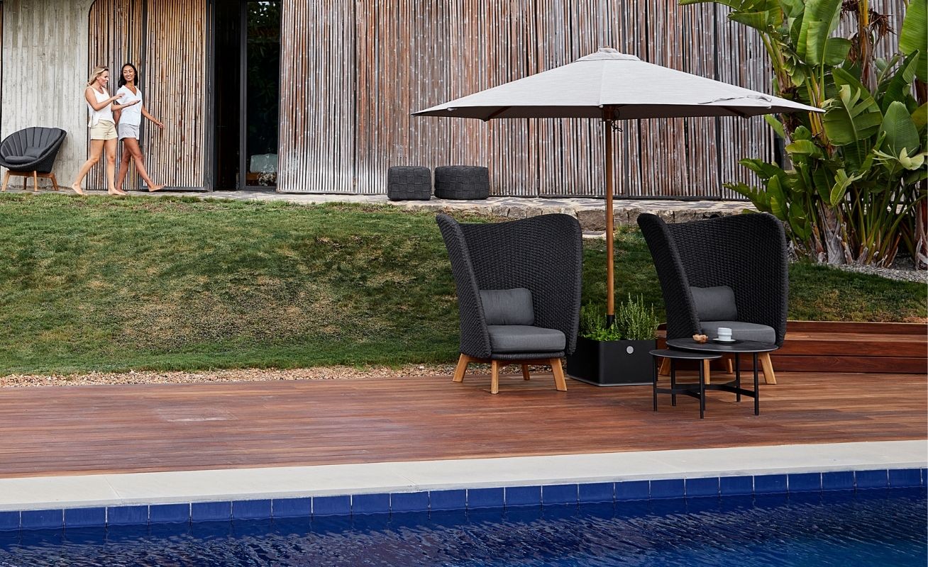 Classic Off-White Parasol With the Peacock Grey Lounge Chair Danish Design Co Singapore