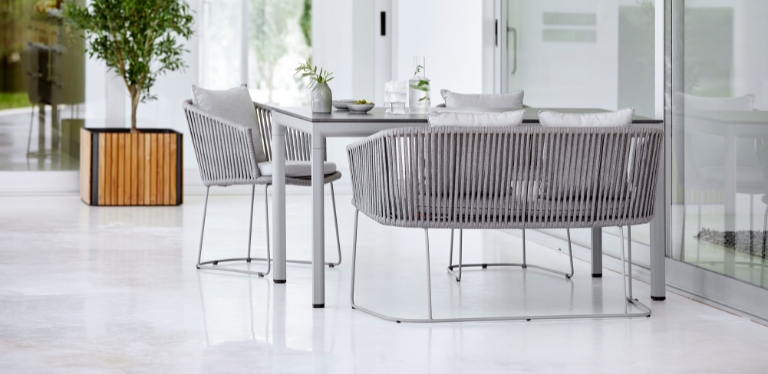 outdoor dining table and chairs in a patio